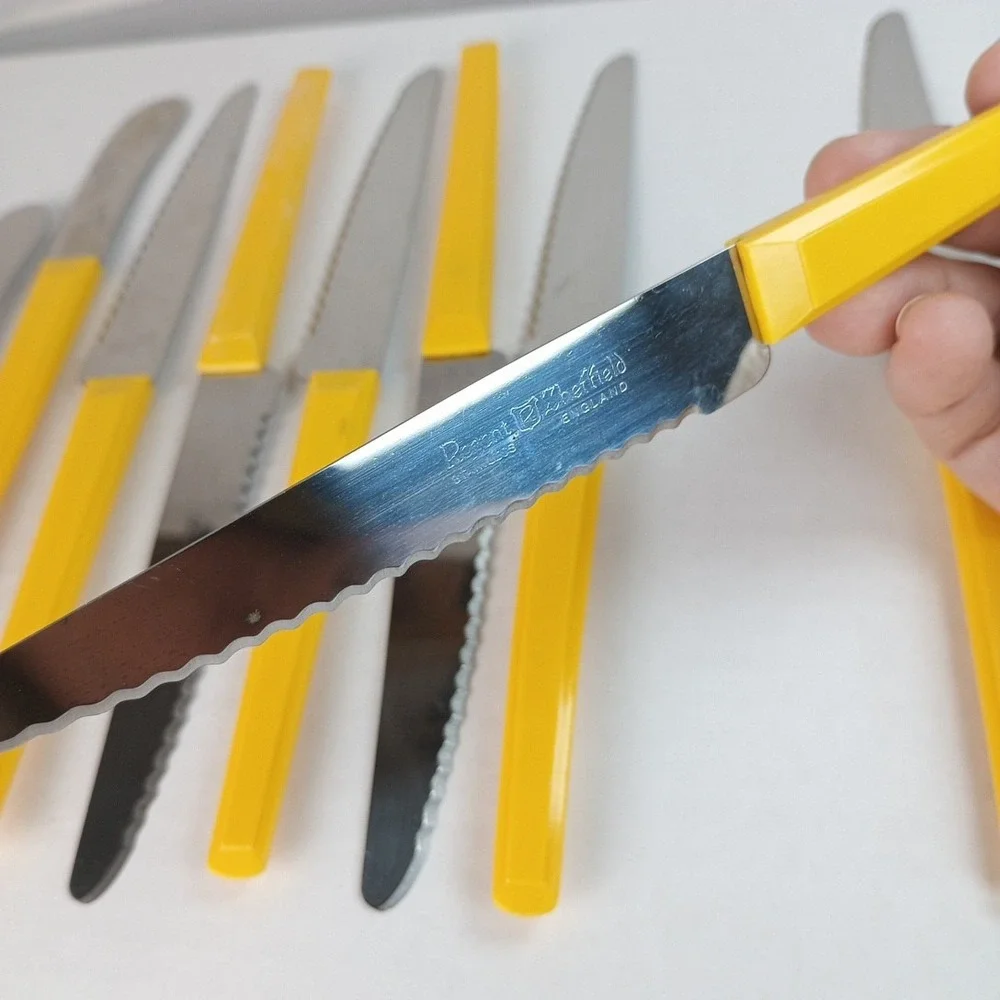 MCM  7 Serrated Knives 2 Spreader Knives Yellow Plastic Handle Regent Sheffield